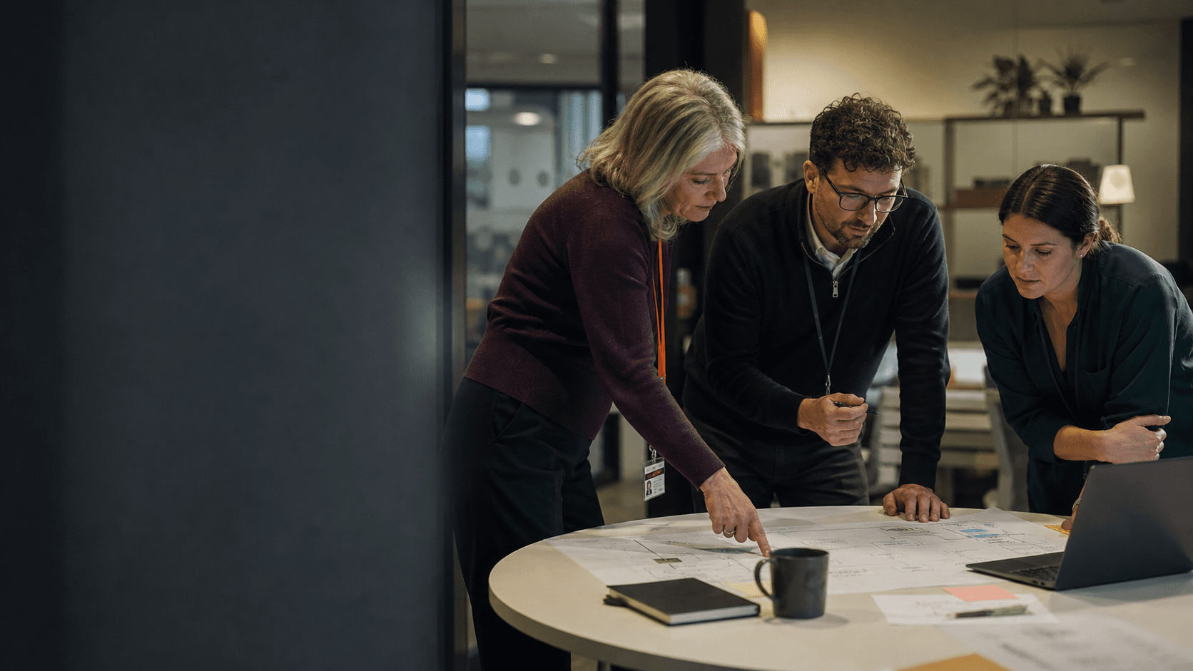 A healthcare operations team reviewing a service workflow